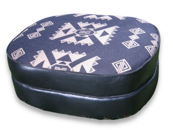 Black and white pendleton and leather ottoman
