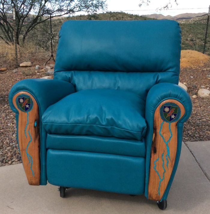 recliner with custom medallians on arms