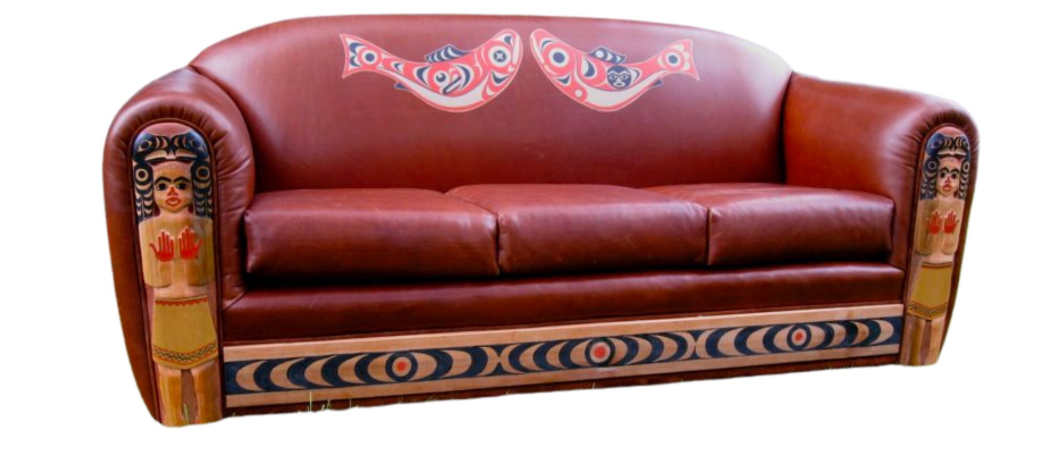Leather sofa with northwest coastal tribal art painting and carving