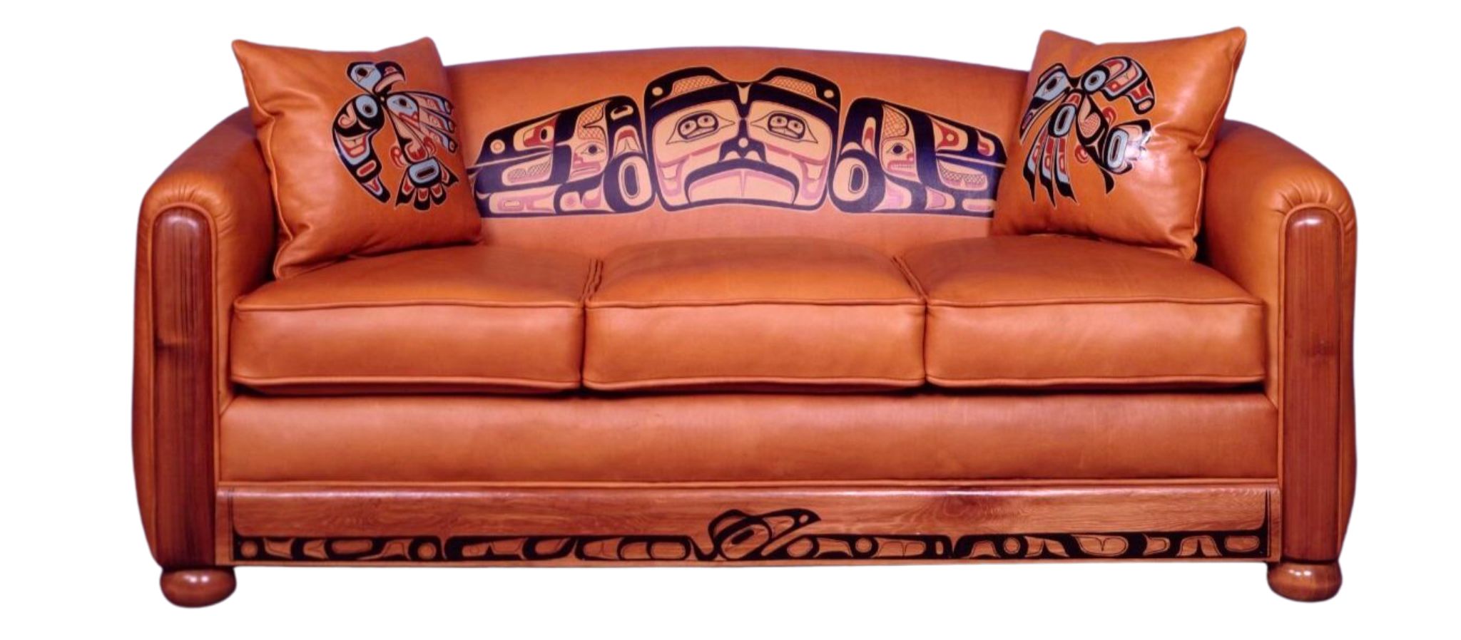 Leather sofa with coastal art